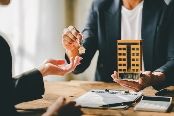 real-estate-agent-delivering-keys-and-model-homes-2026-03-19-09-30-20-utc